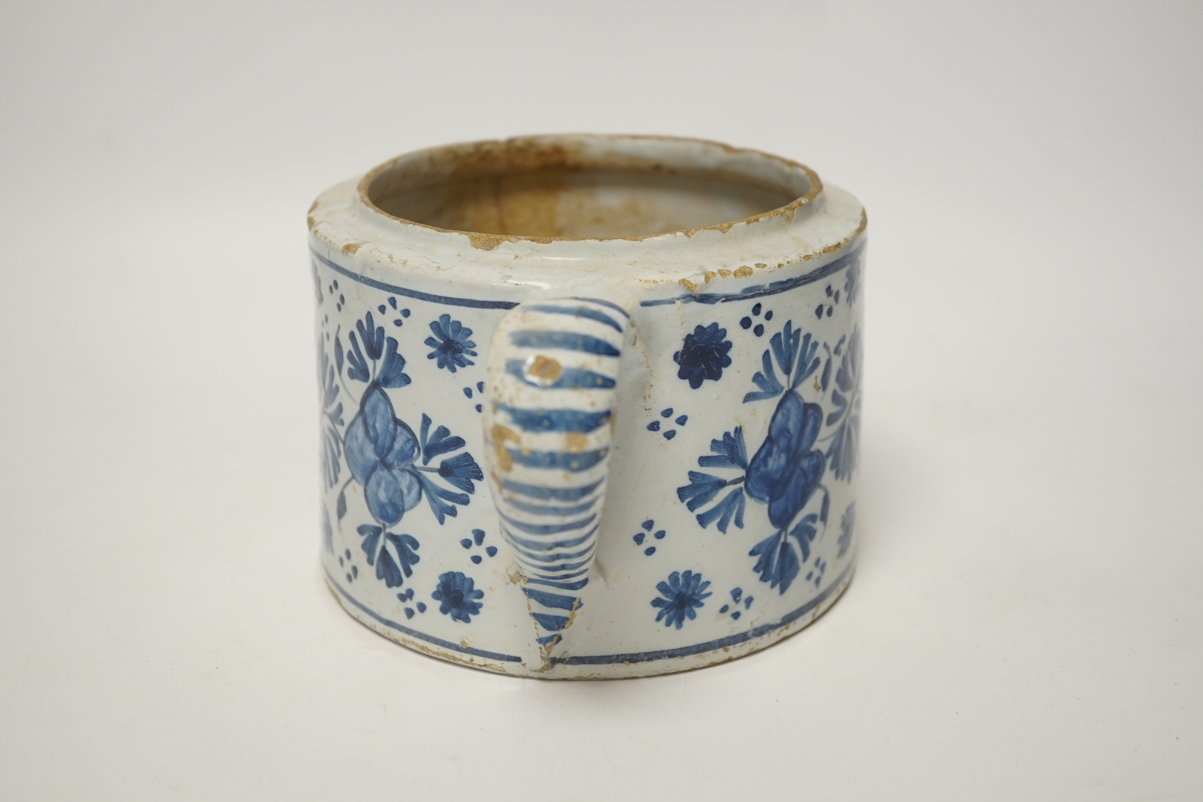 A Delft two handled posset pot, c.1680-1700, 23cm wide including handles